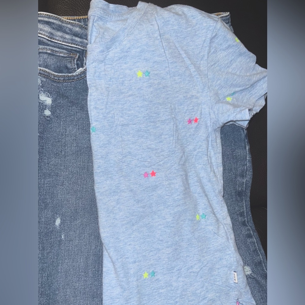 High-Rise Skinny Ankle Jeggings and blue cotton T with embroidered stars.